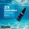 Bottle of Nourish tattoo aftercare product underwater with 2X hydration text overlay