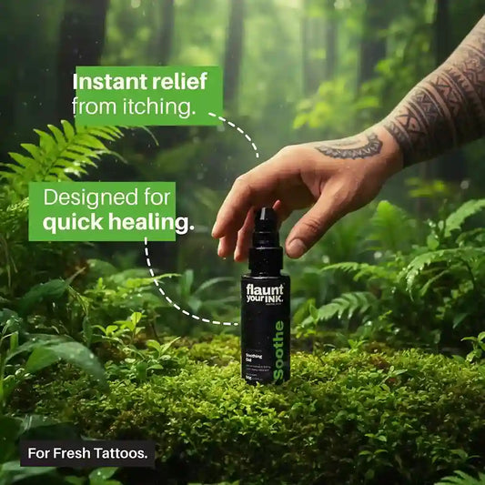 Hand holding a bottle of 'flaunt your INK' tattoo aftercare product and highlighting benefits