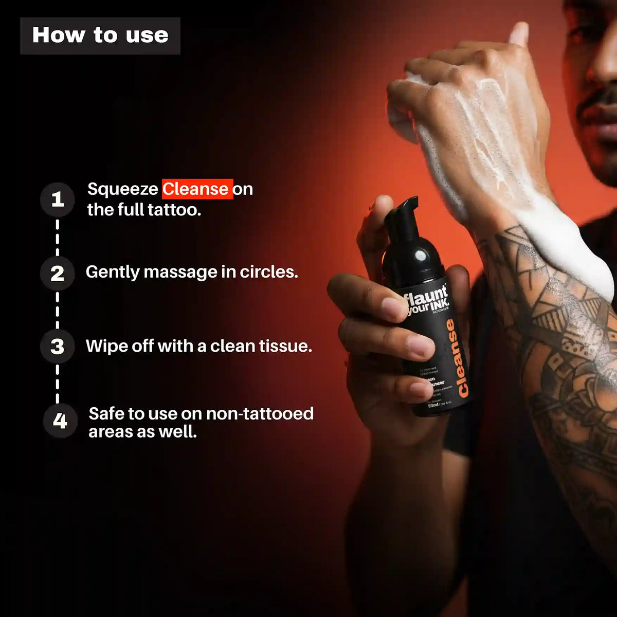 Person holding a bottle of tattoo cleaner with instructions on how to use it.
