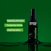 Black bottle labeled ' flaunt your INK' on a green background with text about product trust and user love.