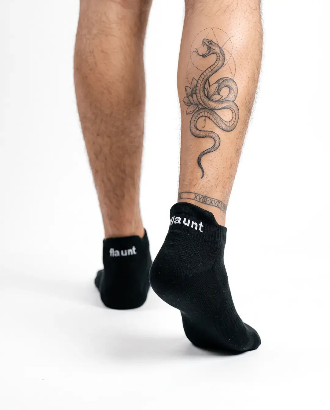Flaunt Socks worn, walking away, white background